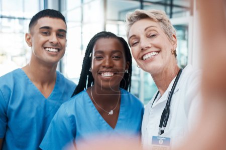 Photo for Hospital, doctor and selfie of medical, nurse and doctors team with a happy smile about health care. Teamwork, collaboration and healthcare community of nursing and medicine workers with diversity. - Royalty Free Image