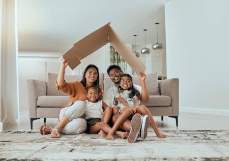 Family, care and home insurance roof portrait with parents protecting house and children. Cardboard, covering and safety with parents keeping with kids safe. Love, mortgage and family house cover.