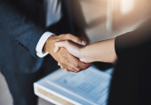 Mergers can help your business deliver increased market power. Closeup shot of two unrecognizable businesspeople shaking hands in an office Poster #619719398