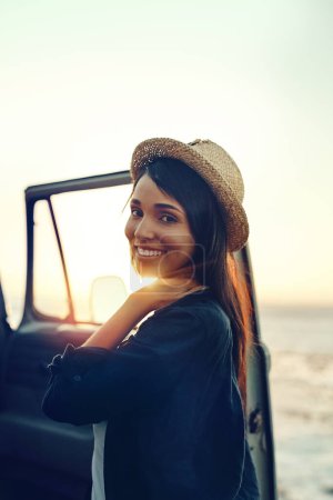 Photo for Summers here and adventure is calling my name. a young woman enjoying a relaxing roadtrip - Royalty Free Image