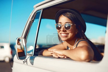 Photo for Hello summer. So happy to see you. a happy young woman going on a road trip - Royalty Free Image