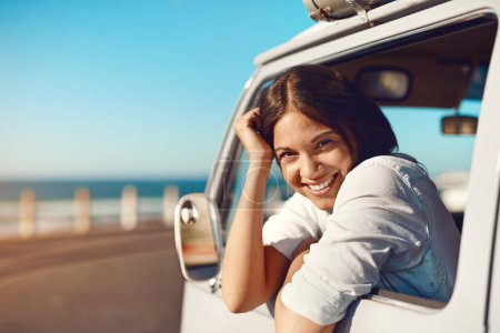 Photo for I made the most of my summer. a happy young woman going on a road trip - Royalty Free Image