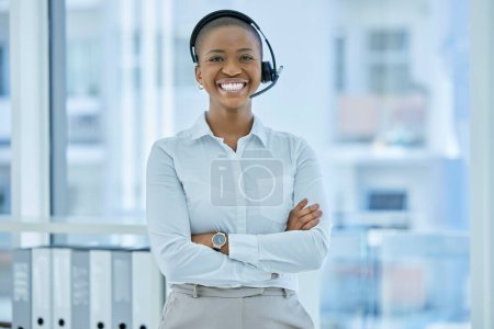 Call center, customer support and happy black woman in communication, consulting and talking to clients. Smile, consultant and telemarketing sales agent employee working in a customer services office.