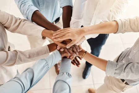 Hands, team with support and solidarity, diversity with business people, collaboration and trust in the workplace. Community, team building and working together, office teamwork and partnership