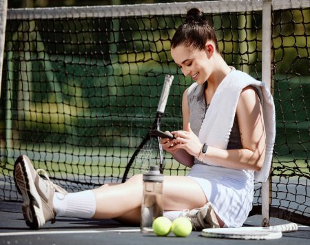 Relax, fit and phone with woman tennis player browsing, social media or web outdoor on the court. A happy young female athlete or sportswoman posting her sport training online or on the internet.