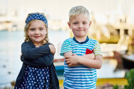 Photo for Whos the cutest. Portrait of a cute little brother and sister posing together on a day out - Royalty Free Image