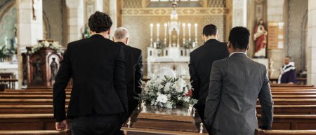 Funeral, church and group carry coffin in service, death or sermon for burial with support. Friends, family or pallbearers with casket for respect, help or sorrow in mourning, worship or god religion.