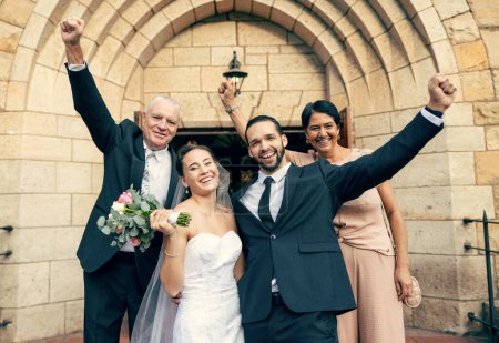 Photo for Wedding, mother and father with a happy couple in celebration of a love marriage event with family pride. Proud mom and dad smiling with a bride and groom with hands raised for a successful union. - Royalty Free Image