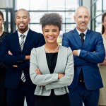 They love what they do and it shows. Cropped portrait of a diverse group of businesspeople standing with their arms crossed in their office