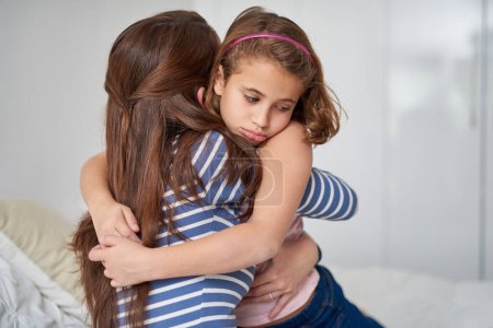 Photo for Ill always be there when you need me. a mother hugging her sad daughter - Royalty Free Image