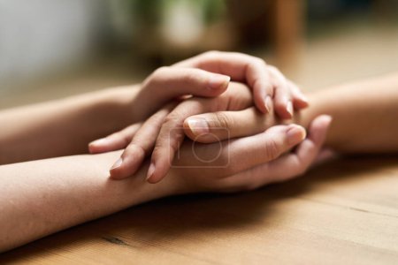 Photo for Its going to be okay. two people holding hands in comfort - Royalty Free Image