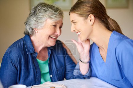 Photo for Youre such a sweetie pie. a resident and a nurse at a retirement home - Royalty Free Image