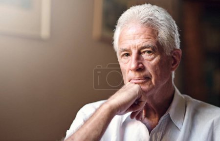 Photo for He takes life very seriously. Portrait of a senior man at home - Royalty Free Image