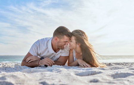 Photo for Love, beach and couple laying in sand, happy woman with man on a summer holiday at ocean. Romance, nature and sun, a happy couple from Australia by the sea, sunset and romantic vacation time together. - Royalty Free Image