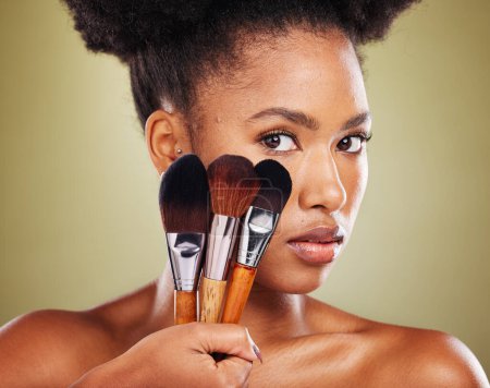 Photo for Makeup brush, black woman and beauty, cosmetics and foundation application accessories, cosmetology products and studio background. Portrait of young african model, beauty tools and facial aesthetic. - Royalty Free Image