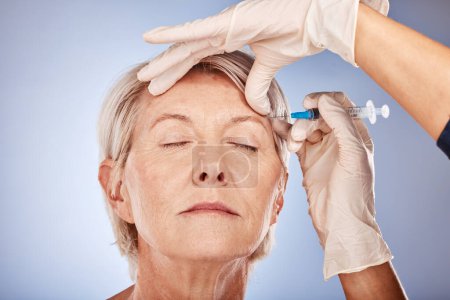 Photo for Skincare, mature woman and botox injection from healthcare professional for anti aging treatment for wrinkles on forehead. Beauty, facial wellness and a senior lady getting collagen filler injected - Royalty Free Image