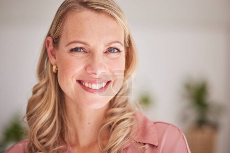 Business woman, face and portrait smile for vision, ambition or career success with a blurred background. Happy blond female leader smiling with teeth in satisfaction for successful company startup.