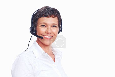 Female customer service representative. Portrait of mature female customer service representative smiling - copyspace