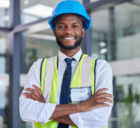 Portrait, construction and engineer man or construction worker with arms crossed in industrial startup office. Architecture, builder and industry with a male business owner in architect company.