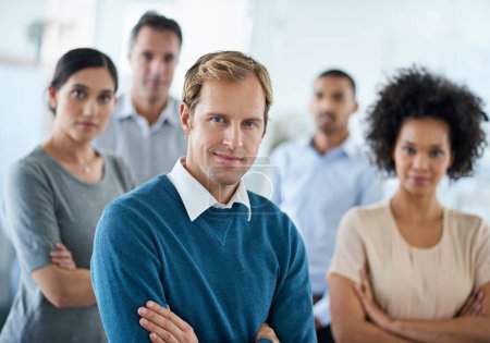 Photo for We set goals and achieve them. Portrait of a group of diverse colleagues standing in an office - Royalty Free Image