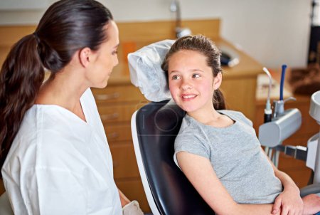 Photo for So what can I do for you today. a female dentist and her child patient - Royalty Free Image