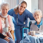 Nursing home, portrait and nurse with senior women after a healthcare checkup, exam or consultation. Happy, medical and caregiver or doctor standing with elderly friends in the retirement facility