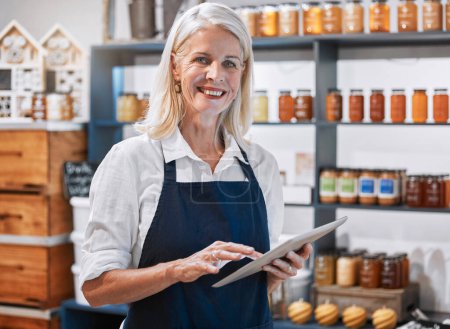 Success, tablet and woman manager of a small business, honey store or retail shop searching online. Smile, portrait and happy entrepreneur scrolling the internet for digital marketing advice or tips.