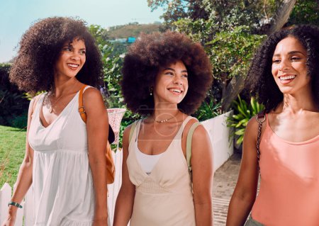 Photo for Summer, travel and black woman friends with communication, talking or happy for outdoor holiday in park, nature or Europe. Vacation, fashion and african girl group walking in countryside together. - Royalty Free Image