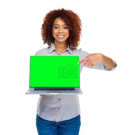 Photo for This could be your webpage. A beautiful young African woman holding a laptop against a white background - Royalty Free Image