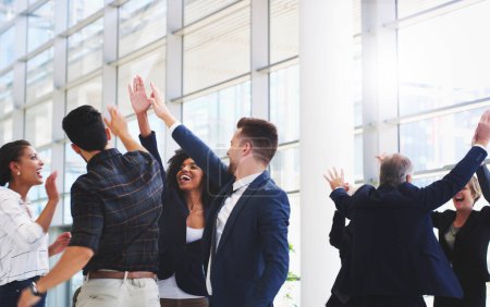 Success, support and winner with business people and high five in office for deal, celebration or global achievement. Teamwork, partnership and contract with employee for goal, sales or target growth.