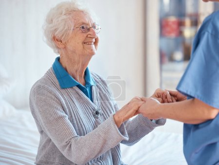 Elderly woman, nurse holding hands and nursing home support with medical professional exam, retirement healthcare and retired lady. Senior rehabilitation center, hospital worker and consulting doctor.