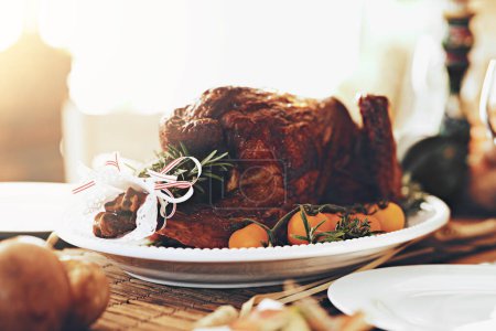 Photo for Turkey, chicken and food for thanksgiving, christmas and family lunch, dinner table setting and party, celebration and cooking in home. Background meat, feast and roasted chicken, dining and eating. - Royalty Free Image