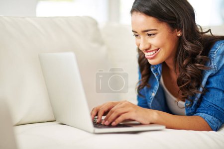 Laptop, black woman on laying on sofa writing email, checking social media or streaming movie at home. Weekend, woman on couch with computer and relax on break in living room surfing the internet Mouse Pad 624702160