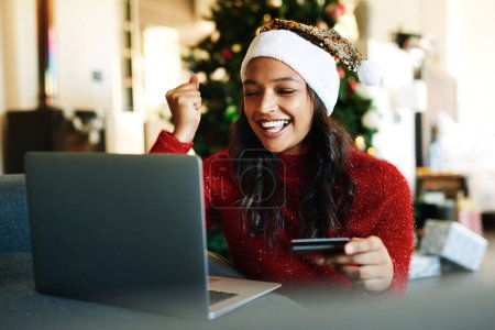 Photo for Laptop, online shopping and woman celebrate Christmas, ecommerce and buying gift or xmas present. Happy, excited girl and celebrate online banking or order holiday surprise, happiness on pc at home. - Royalty Free Image