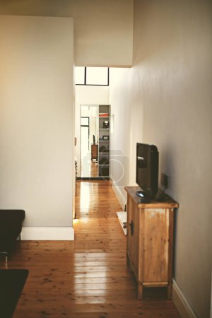 Photo for Home sweet home. Interior shot of a corridor leading from the living room to the bedroom - Royalty Free Image