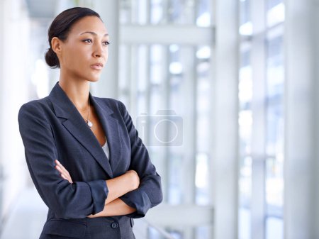 Focusing on her career. An attractive business woman looking focused