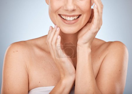 Happy woman, skincare and beauty cosmetics for shine, wellness and healthy glow on studio background. Closeup of model touching face after facial, laser results and chemical peel for clean aesthetics.