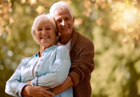 Photo for Senior couple, hug and face portrait at park on holiday or vacation mockup. Love, romance or retired elderly man hugging or embrace woman outdoors in nature, bonding or enjoying quality time together. - Royalty Free Image
