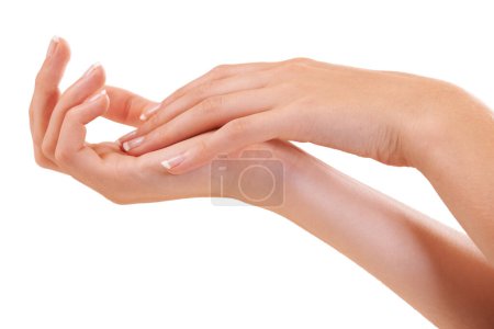 Téléchargez les photos : S'assurer que chaque centimètre de sa main est hydratée. une main de femme - en image libre de droit