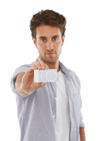 Photo for Take my card. Portrait of a handsome man holding up a business card of copyspace - Royalty Free Image