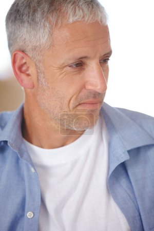 Photo for Thinking back...Closeup of a handsome mature man looking out of frame - Royalty Free Image