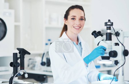 Photo for This is the right career for her. Portrait of a cheerful young female scientist doing tests inside of a laboratory during the day - Royalty Free Image