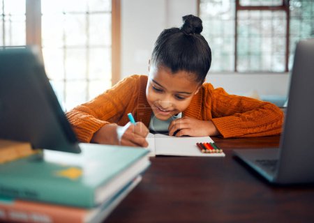 E learning, writing and child in home education, online course and learning on laptop, notebook and stationery for mind development. Happy kid drawing in book for school, knowledge and virtual class.