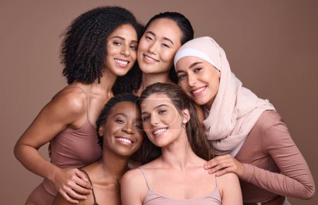 Women, faces or diversity on studio background in empowerment trust, solidarity support or community self love. Portrait, smile or group beauty models, happy facial expression or religion acceptance.