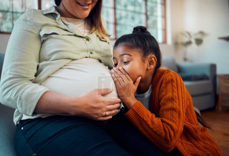 Pregnant, children and stomach with a mother and daughter whispering to a sibling in a belly at home. Whisper, love and kids with a girl talking to her unborn sister in the tummy of a woman.