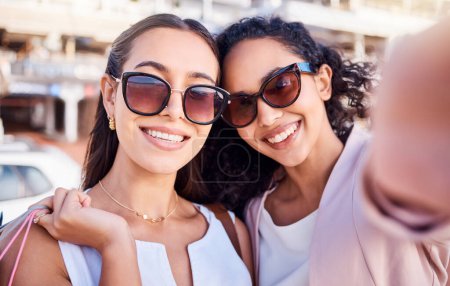 Photo for Selfie, women or friends shopping in city, smile or wealth for luxury clothes, boutique or sale. Customers, ladies or girls with bags, sunglasses or clients with social media, rich or happy in street. - Royalty Free Image