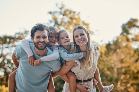 Family, park and portrait of parents with kids enjoying summer holiday, weekend and quality time outdoors. Love, nature and happy mother, father and children smiling, bonding and relax together.
