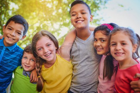 Photo for The fun never stops when you a kid. a diverse group of children outside - Royalty Free Image