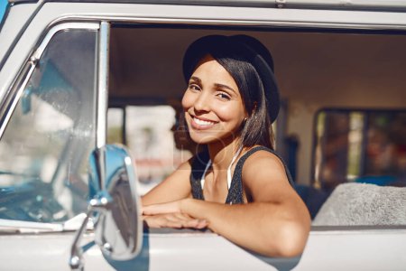 Photo for Summer - lets take the long way home. a happy young woman going on a road trip - Royalty Free Image