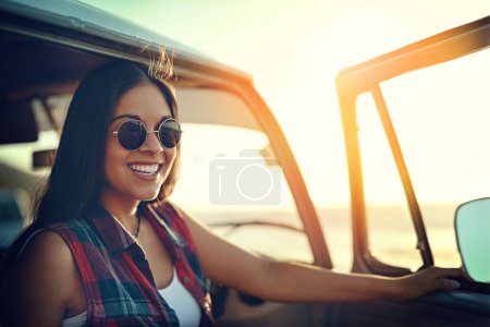 Photo for Go find adventure and get more mileage out of life. a young woman enjoying a relaxing roadtrip - Royalty Free Image